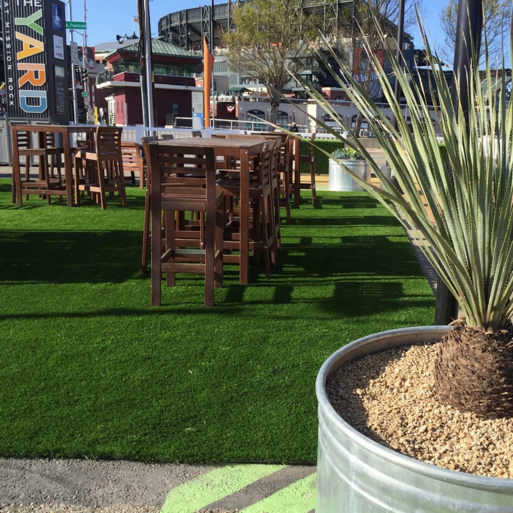 Create a hang out area with artificial grass outside of your events space