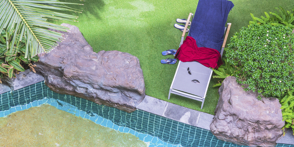 Artificial lawn for outdoor spaces around pools and decks.