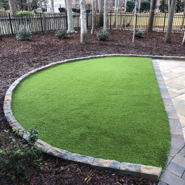 Olive-92-Stemgrass artificial turf with pavers in backyard