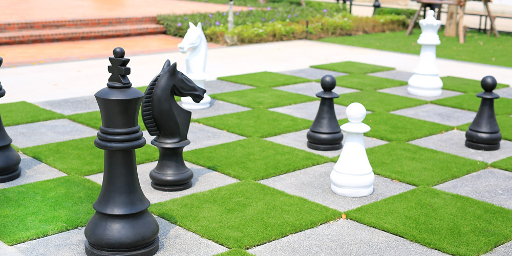 Artificial turf remnants make up a chessboard
